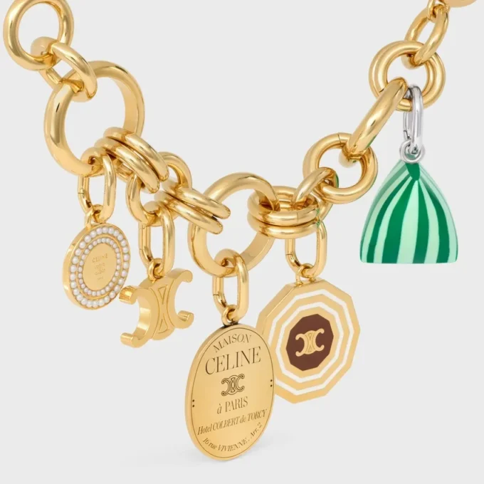 Charms Decagon Triomphe Medal in Enamel and Brass with Gold Finish Charms Decagon Triomphe Medal in Enamel and Brass with Gold Finish