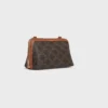 Clutch on Chain in Triomphe Canvas and Lambskin Clutch on Chain in Triomphe Canvas and Lambskin