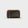 Clutch on Chain in Triomphe Canvas and Lambskin Clutch on Chain in Triomphe Canvas and Lambskin