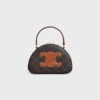 Half Moon Case in Triomphe Canvas and Calfskin Half Moon Case in Triomphe Canvas and Calfskin