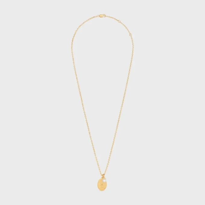 Les Perles Celine Medal Necklace in Resin Pearl and Brass with Gold Finish Les Perles Celine Medal Necklace in Resin Pearl and Brass with Gold Finish