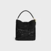 Medium Louise Bucket in Raffia and Calfskin Medium Louise Bucket in Raffia and Calfskin