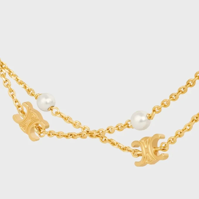 Triomphe Pearl Double Necklace in Brass with Gold Finish and Resin Pearls Triomphe Pearl Double Necklace in Brass with Gold Finish and Resin Pearls